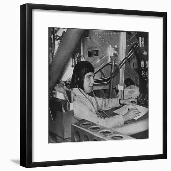 RAF flight engineer on board an aircraft, c1940 (1943)-Unknown-Framed Photographic Print