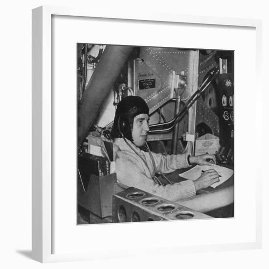 RAF flight engineer on board an aircraft, c1940 (1943)-Unknown-Framed Photographic Print