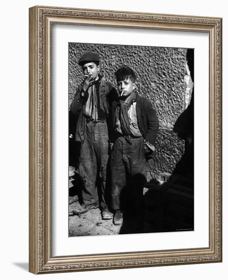 Ragged, Filthy, Poverty Stricken, Street Boys Smoking Cigarettes Begged from American Soldiers-George Rodger-Framed Photographic Print