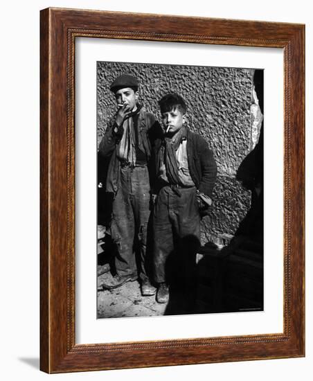 Ragged, Filthy, Poverty Stricken, Street Boys Smoking Cigarettes Begged from American Soldiers-George Rodger-Framed Photographic Print