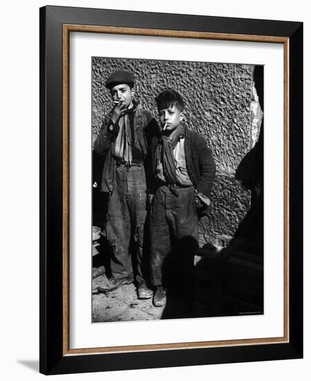 Ragged, Filthy, Poverty Stricken, Street Boys Smoking Cigarettes Begged from American Soldiers-George Rodger-Framed Photographic Print