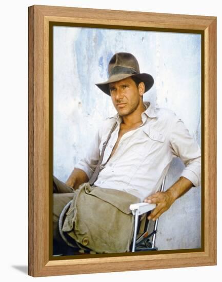 RAIDERS OF THE LOST ARK, 1981 On the set, Harrison Ford (photo)-null-Framed Stretched Canvas