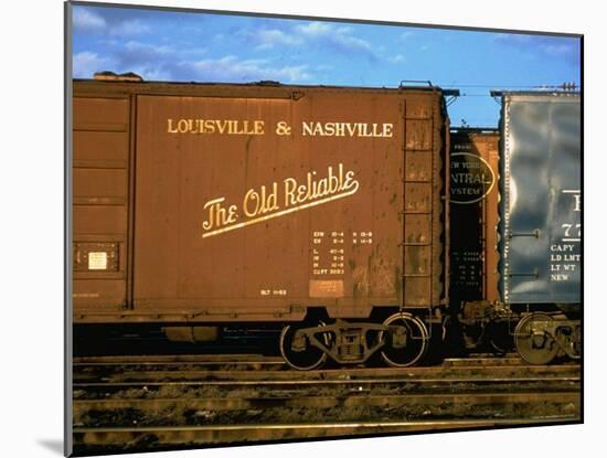 Railroad Box Cars, One with Logo of Louisville and Nashville Railroad and Name "The Old Reliable"-Walker Evans-Mounted Photographic Print
