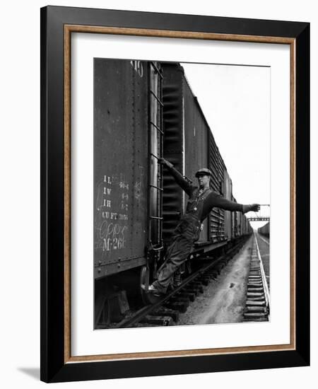 Railroad Brakeman George Christian, Swinging His Arm Horizontally to Signal to Locomotive Engineer-Alfred Eisenstaedt-Framed Photographic Print