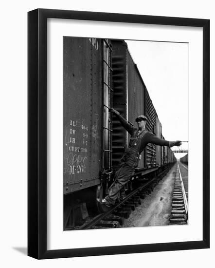 Railroad Brakeman George Christian, Swinging His Arm Horizontally to Signal to Locomotive Engineer-Alfred Eisenstaedt-Framed Photographic Print