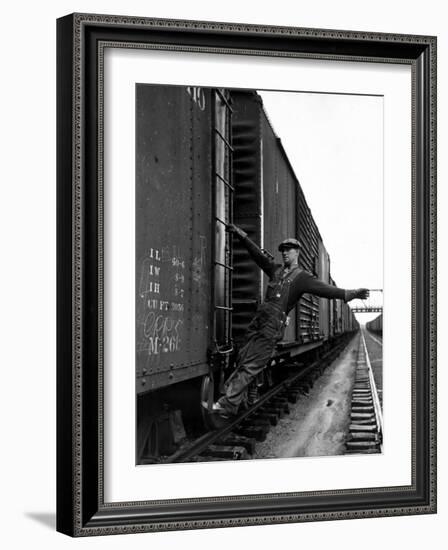 Railroad Brakeman George Christian, Swinging His Arm Horizontally to Signal to Locomotive Engineer-Alfred Eisenstaedt-Framed Photographic Print