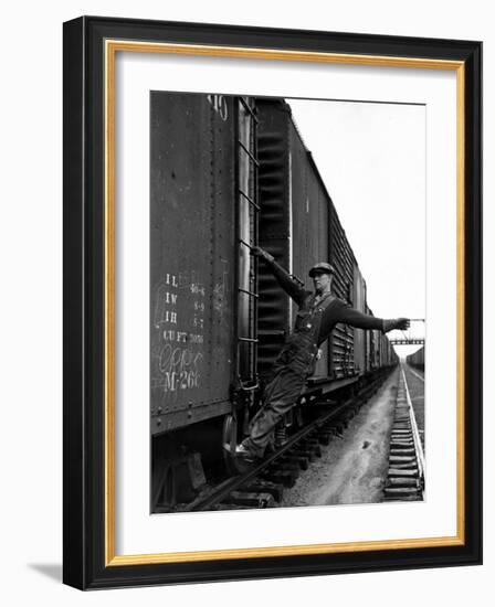Railroad Brakeman George Christian, Swinging His Arm Horizontally to Signal to Locomotive Engineer-Alfred Eisenstaedt-Framed Photographic Print