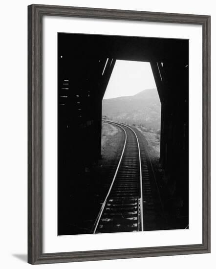 Railroad Tracks as Seen Through the Tunnel-Peter Stackpole-Framed Photographic Print