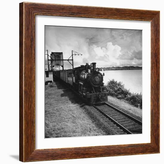 Railroad Train Following Tracks Beside Panama Canal-Thomas D^ Mcavoy-Framed Photographic Print