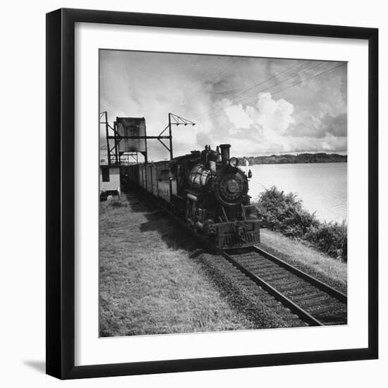 Railroad Train Following Tracks Beside Panama Canal-Thomas D^ Mcavoy-Framed Photographic Print