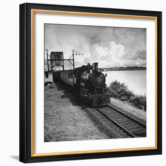 Railroad Train Following Tracks Beside Panama Canal-Thomas D^ Mcavoy-Framed Photographic Print