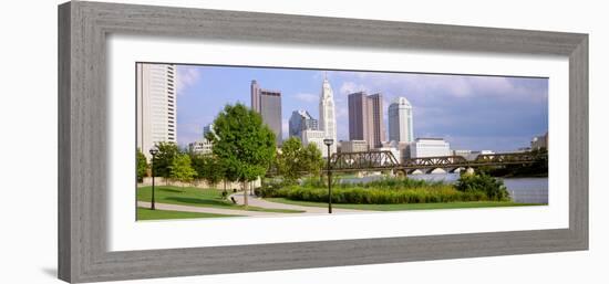 Railway bridge across a river with skyscrapers in the background, Scioto River, Columbus, Ohio, USA-null-Framed Photographic Print