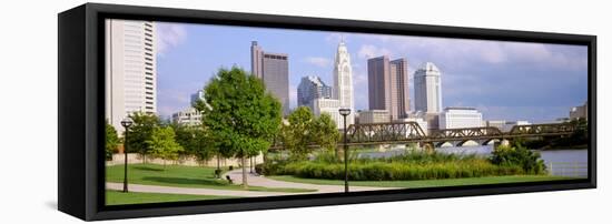 Railway bridge across a river with skyscrapers in the background, Scioto River, Columbus, Ohio, USA-null-Framed Premier Image Canvas