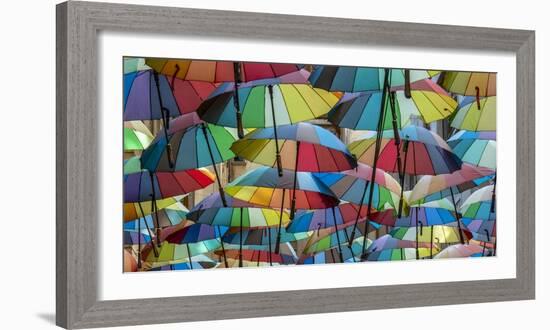 Rainbow umbrellas, Bucharest, Romania-Art Wolfe Wolfe-Framed Photographic Print