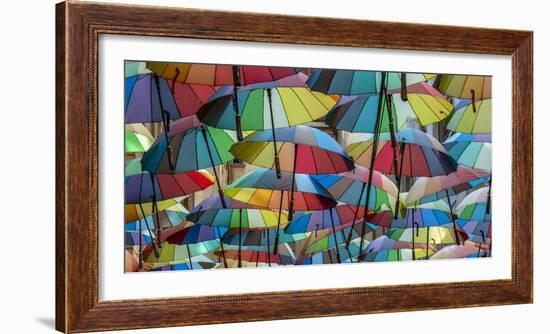 Rainbow umbrellas, Bucharest, Romania-Art Wolfe Wolfe-Framed Photographic Print