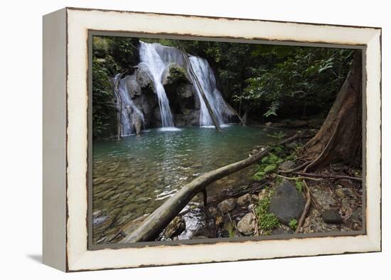 Rainforest waterfall, Batenta Island, Raja Ampat, Western Papua, Indonesian New Guinea-Staffan Widstrand-Framed Premier Image Canvas