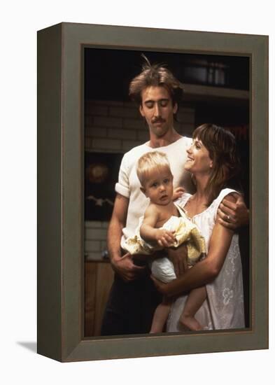 RAISIN ARIZONA, 1987 directed by JOEL AND ETHAN COEN Nicolas Cage and Holly Hunter (photo)-null-Framed Stretched Canvas