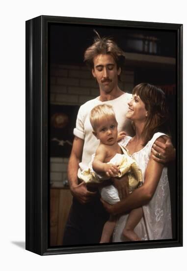 RAISIN ARIZONA, 1987 directed by JOEL AND ETHAN COEN Nicolas Cage and Holly Hunter (photo)-null-Framed Stretched Canvas