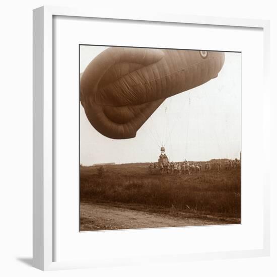 Raising of barrage balloon with basket for observation, c1914-c1918-Unknown-Framed Photographic Print