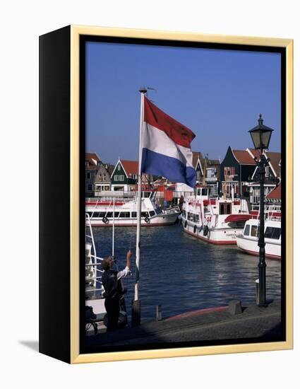 Raising the Dutch Flag by the Harbour, Volendam, Ijsselmeer, Holland-I Vanderharst-Framed Premier Image Canvas