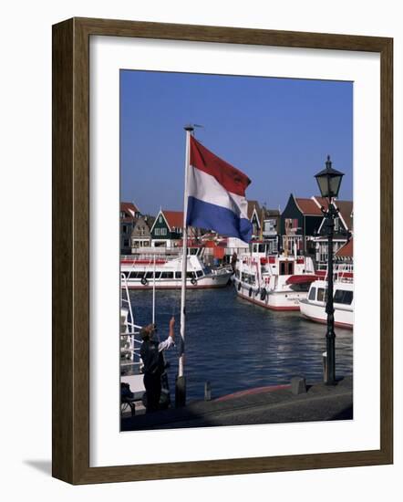 Raising the Dutch Flag by the Harbour, Volendam, Ijsselmeer, Holland-I Vanderharst-Framed Photographic Print