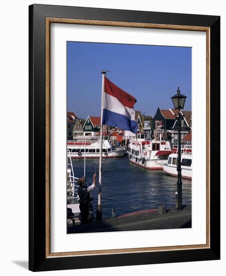 Raising the Dutch Flag by the Harbour, Volendam, Ijsselmeer, Holland-I Vanderharst-Framed Photographic Print