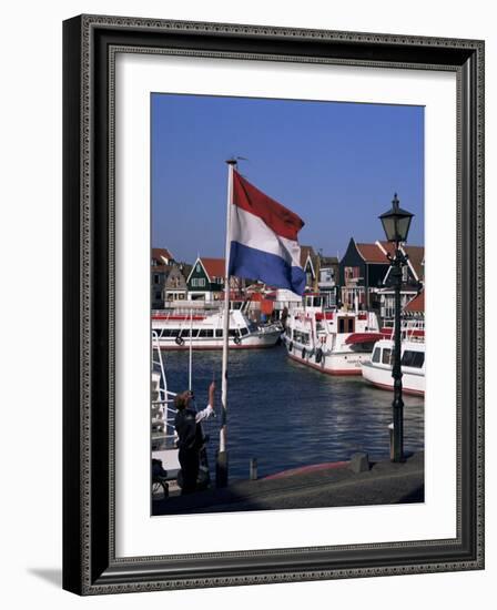 Raising the Dutch Flag by the Harbour, Volendam, Ijsselmeer, Holland-I Vanderharst-Framed Photographic Print