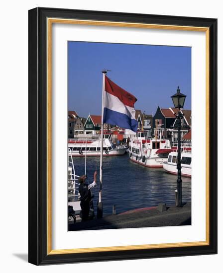 Raising the Dutch Flag by the Harbour, Volendam, Ijsselmeer, Holland-I Vanderharst-Framed Photographic Print