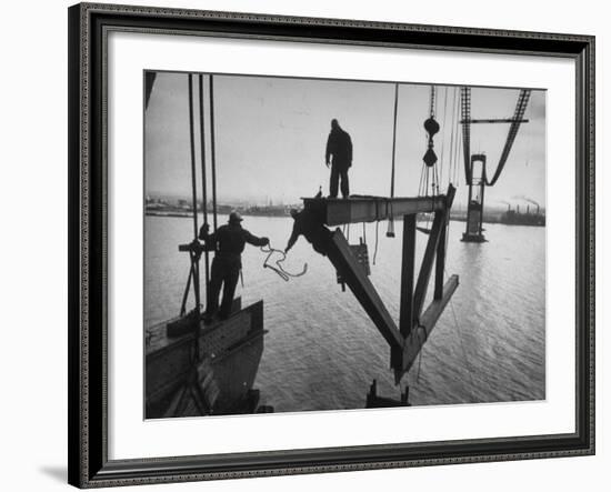 Raising the Truss, Men of the Raising Gang Ride the Swinging Steel 160 Feet Above the Water-Peter Stackpole-Framed Photographic Print