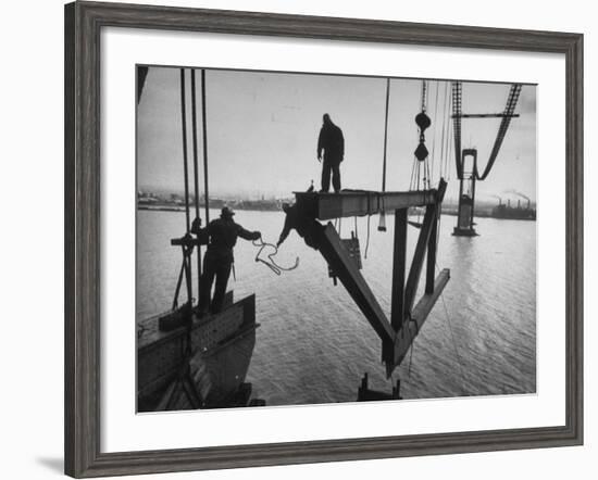 Raising the Truss, Men of the Raising Gang Ride the Swinging Steel 160 Feet Above the Water-Peter Stackpole-Framed Photographic Print