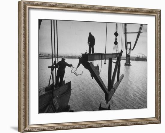 Raising the Truss, Men of the Raising Gang Ride the Swinging Steel 160 Feet Above the Water-Peter Stackpole-Framed Photographic Print