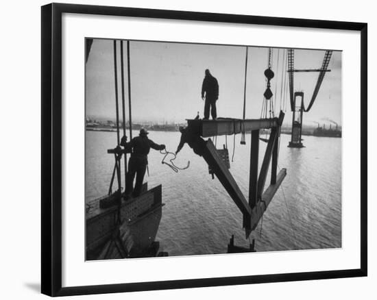 Raising the Truss, Men of the Raising Gang Ride the Swinging Steel 160 Feet Above the Water-Peter Stackpole-Framed Photographic Print