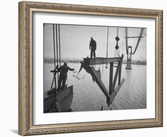 Raising the Truss, Men of the Raising Gang Ride the Swinging Steel 160 Feet Above the Water-Peter Stackpole-Framed Photographic Print