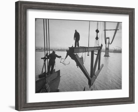 Raising the Truss, Men of the Raising Gang Ride the Swinging Steel 160 Feet Above the Water-Peter Stackpole-Framed Photographic Print