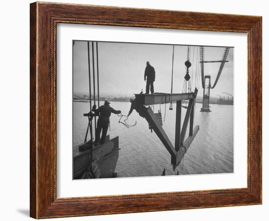 Raising the Truss, Men of the Raising Gang Ride the Swinging Steel 160 Feet Above the Water-Peter Stackpole-Framed Photographic Print