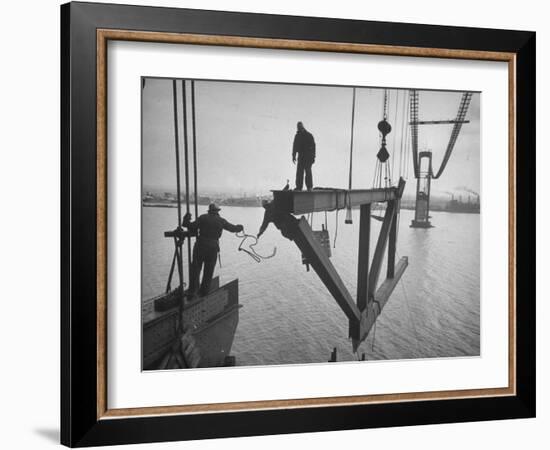 Raising the Truss, Men of the Raising Gang Ride the Swinging Steel 160 Feet Above the Water-Peter Stackpole-Framed Photographic Print