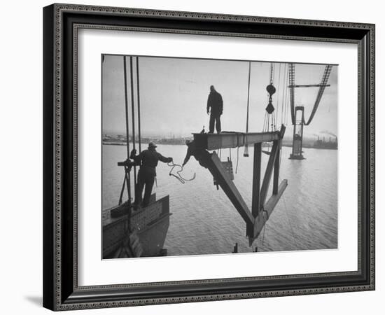 Raising the Truss, Men of the Raising Gang Ride the Swinging Steel 160 Feet Above the Water-Peter Stackpole-Framed Photographic Print