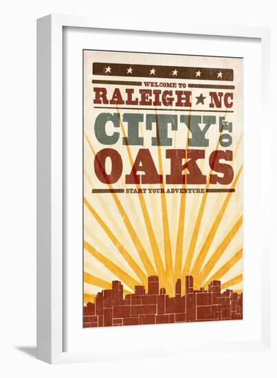 Raleigh, North Carolina - Skyline and Sunburst Screenprint Style-Lantern Press-Framed Art Print