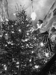 Mrs. George Sutton and Her Family Decorating Their Christmas Tree at Home-Ralph Crane-Photographic Print