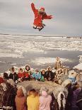 Native Alaskans Playing a Game of Nulukatuk, in Which Individals are Tossed into the Air-Ralph Crane-Photographic Print