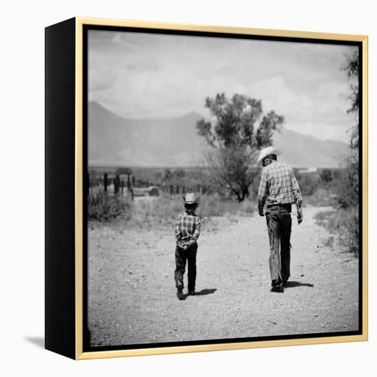 Rancher James A. Shugart Walking a Dusty Road with Son James Jr-Allan Grant-Framed Premier Image Canvas