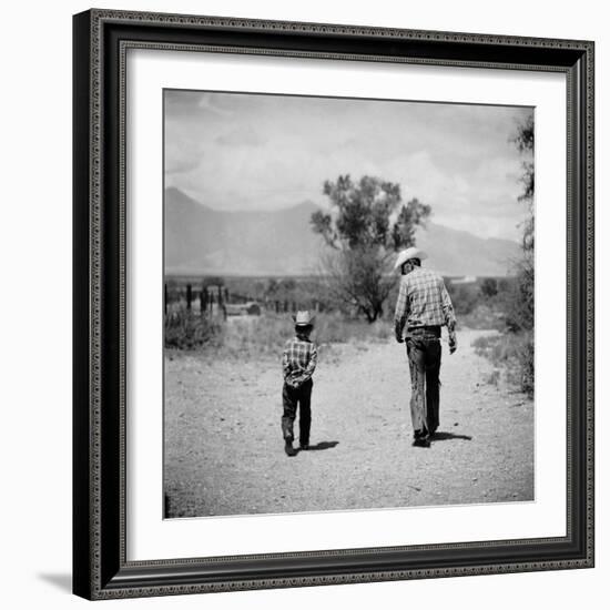 Rancher James A. Shugart Walking a Dusty Road with Son James Jr-Allan Grant-Framed Photographic Print