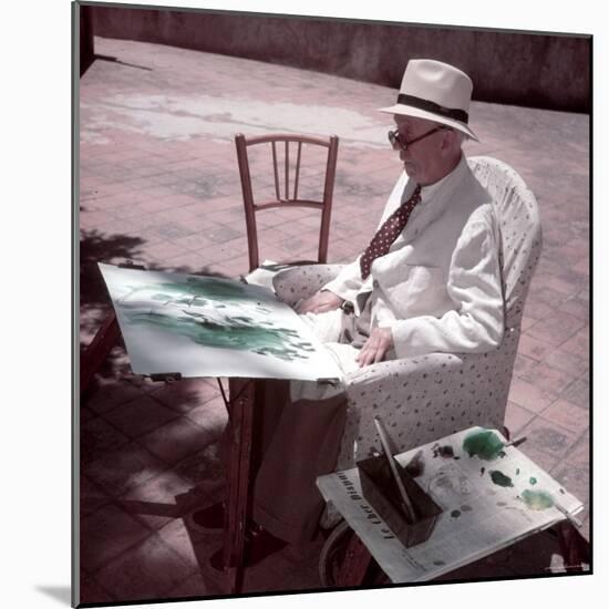 Raoul Dufy Painting on Sunny Terrace in Caldas de Montbuy, Spain-Gjon Mili-Mounted Premium Photographic Print