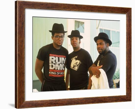 Rap Group Run DMC: Darryl McDaniels, Joe Simmons and Jason Mizell-David Mcgough-Framed Premium Photographic Print