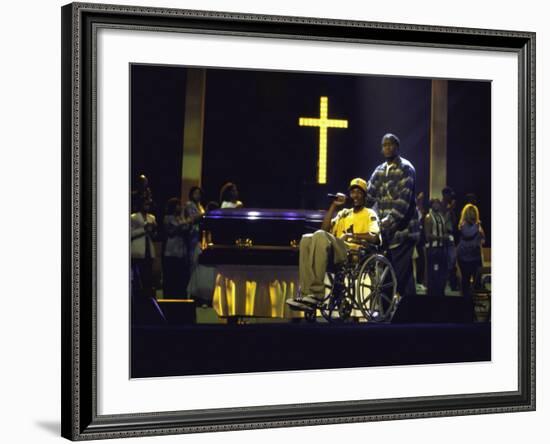 Rapper Snoop Doggy Dogg Performing in a Wheel Chair on Stage at Radio City Music Hall-null-Framed Premium Photographic Print