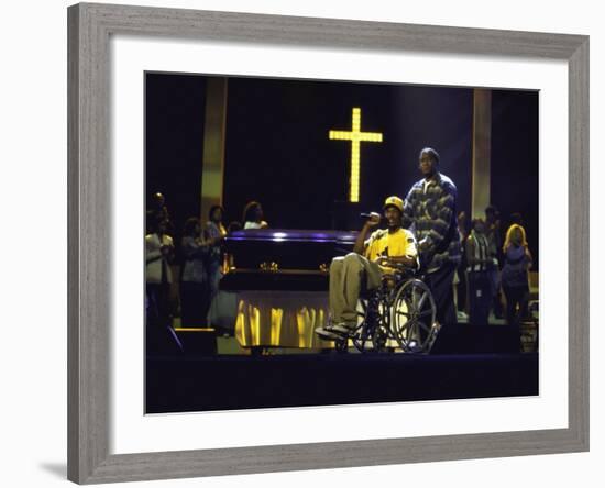 Rapper Snoop Doggy Dogg Performing in a Wheel Chair on Stage at Radio City Music Hall-null-Framed Premium Photographic Print