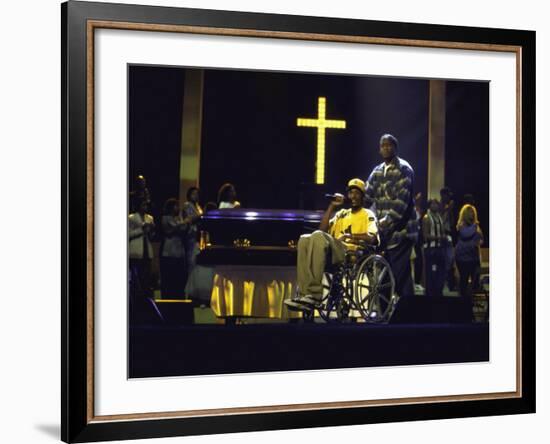 Rapper Snoop Doggy Dogg Performing in a Wheel Chair on Stage at Radio City Music Hall-null-Framed Premium Photographic Print