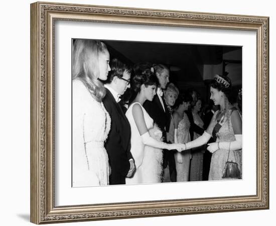 Raquel Welch Meets Queen Elizabeth in 1966 with Woody Allen and Ursula Andress-null-Framed Photographic Print