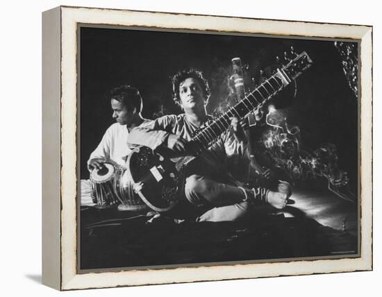 Ravi Shankar Passionately Playing the Sitar-Paul Schutzer-Framed Premier Image Canvas