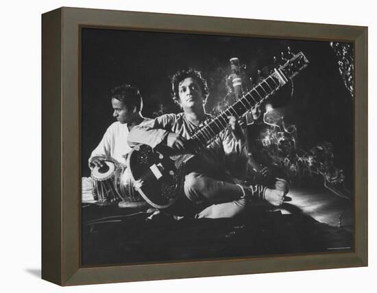 Ravi Shankar Passionately Playing the Sitar-Paul Schutzer-Framed Premier Image Canvas